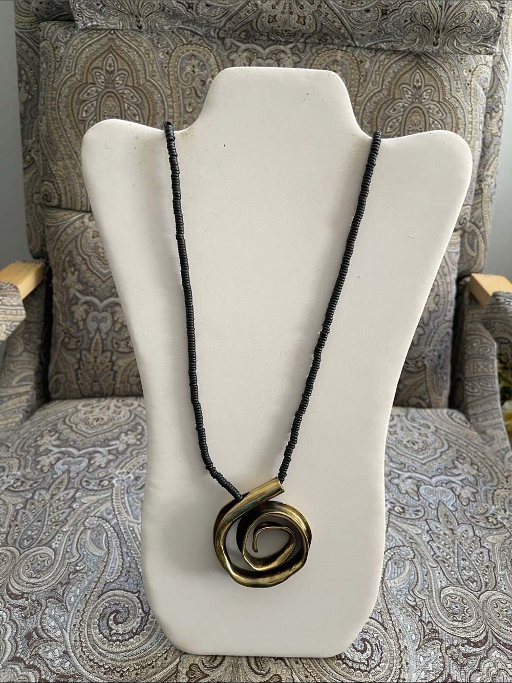 Handcrafted Black Bead Necklace with Bronze Spiral Pendant